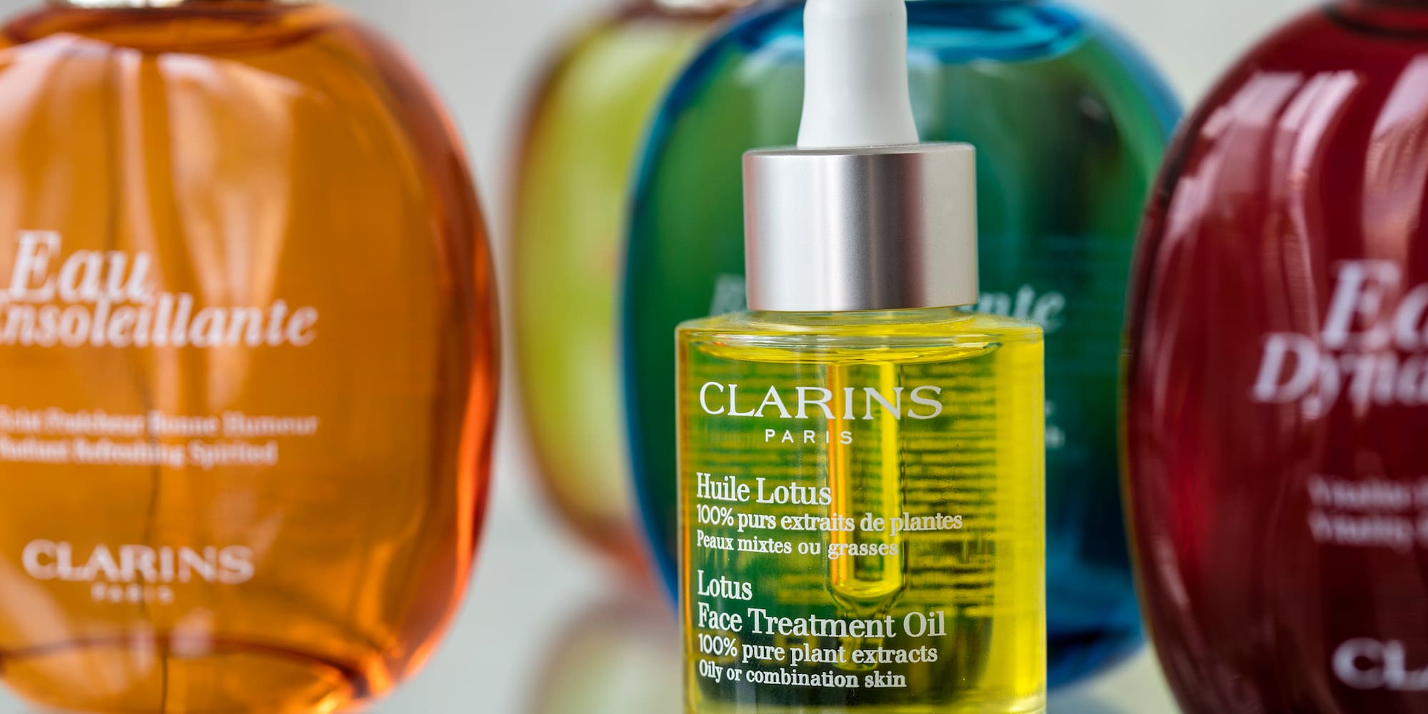 a bottle of oil with a dropper