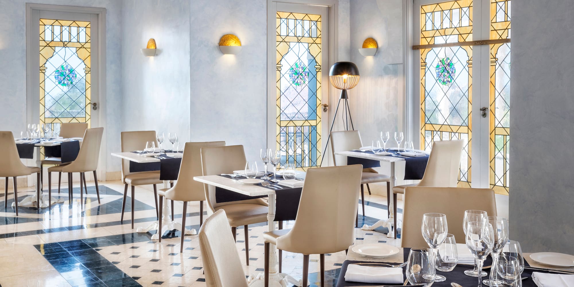 a restaurant with tables and chairs