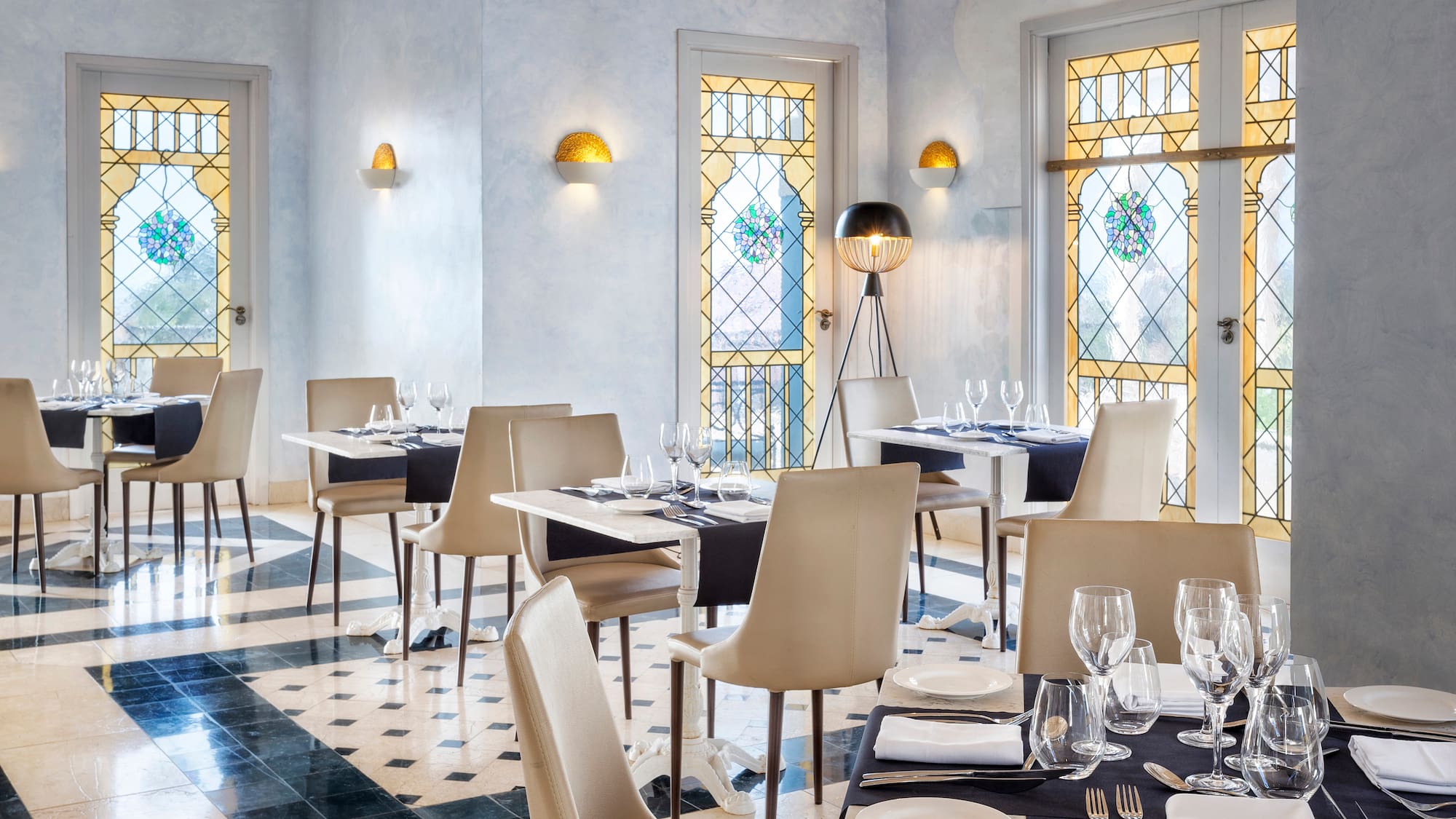 a restaurant with tables and chairs