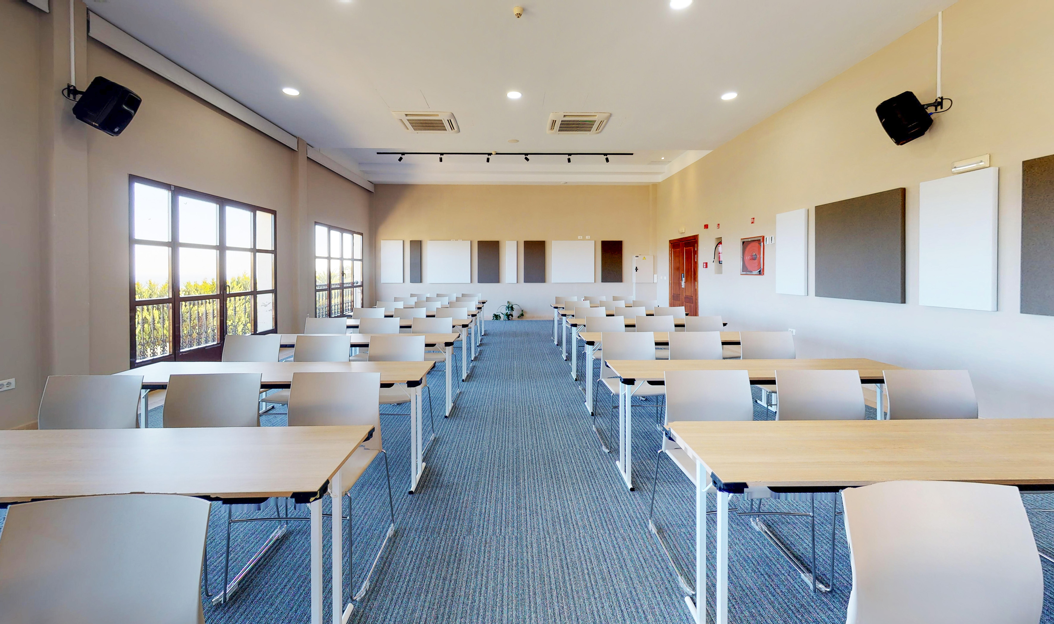 a room with tables and chairs