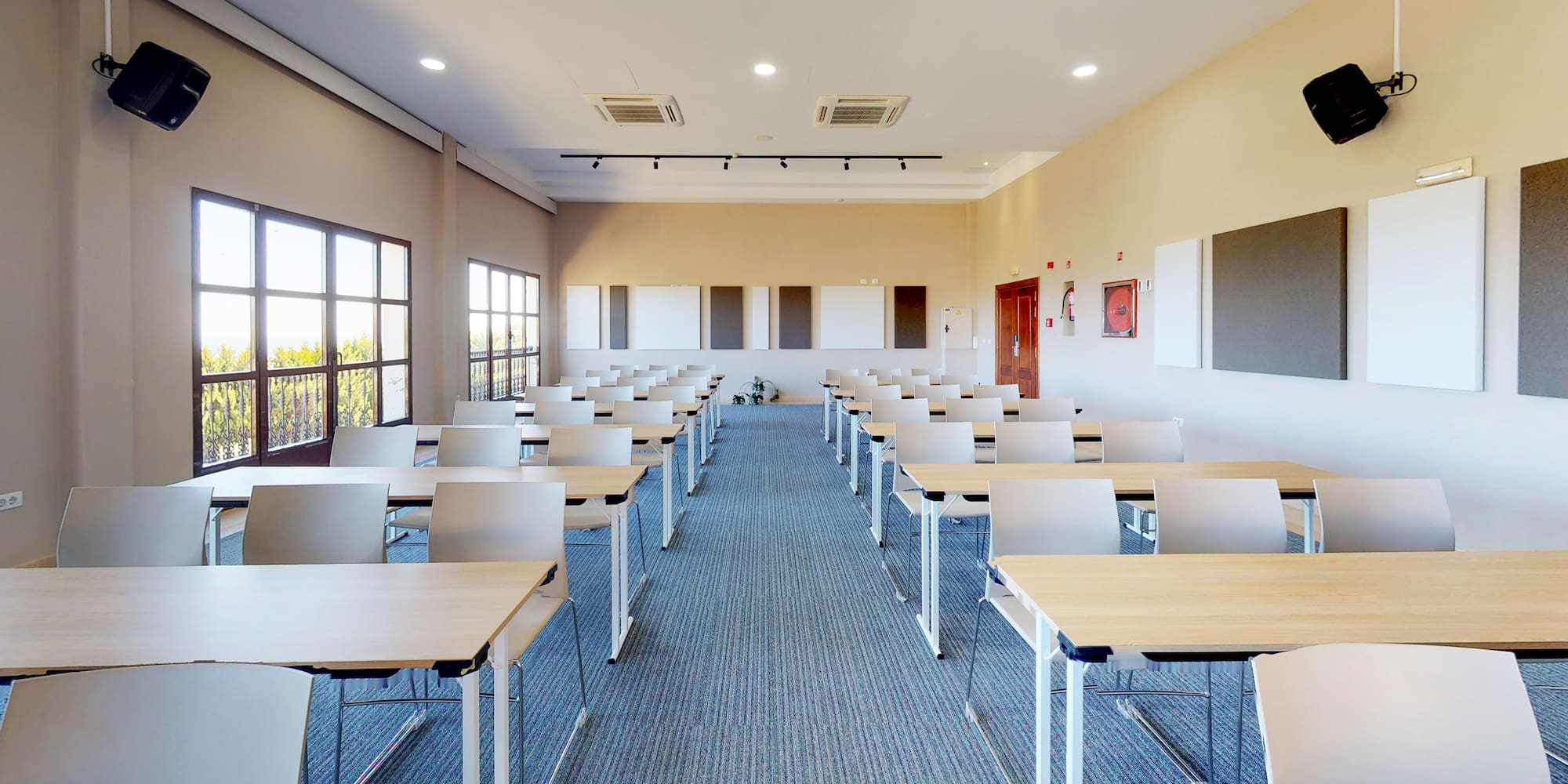 a room with tables and chairs