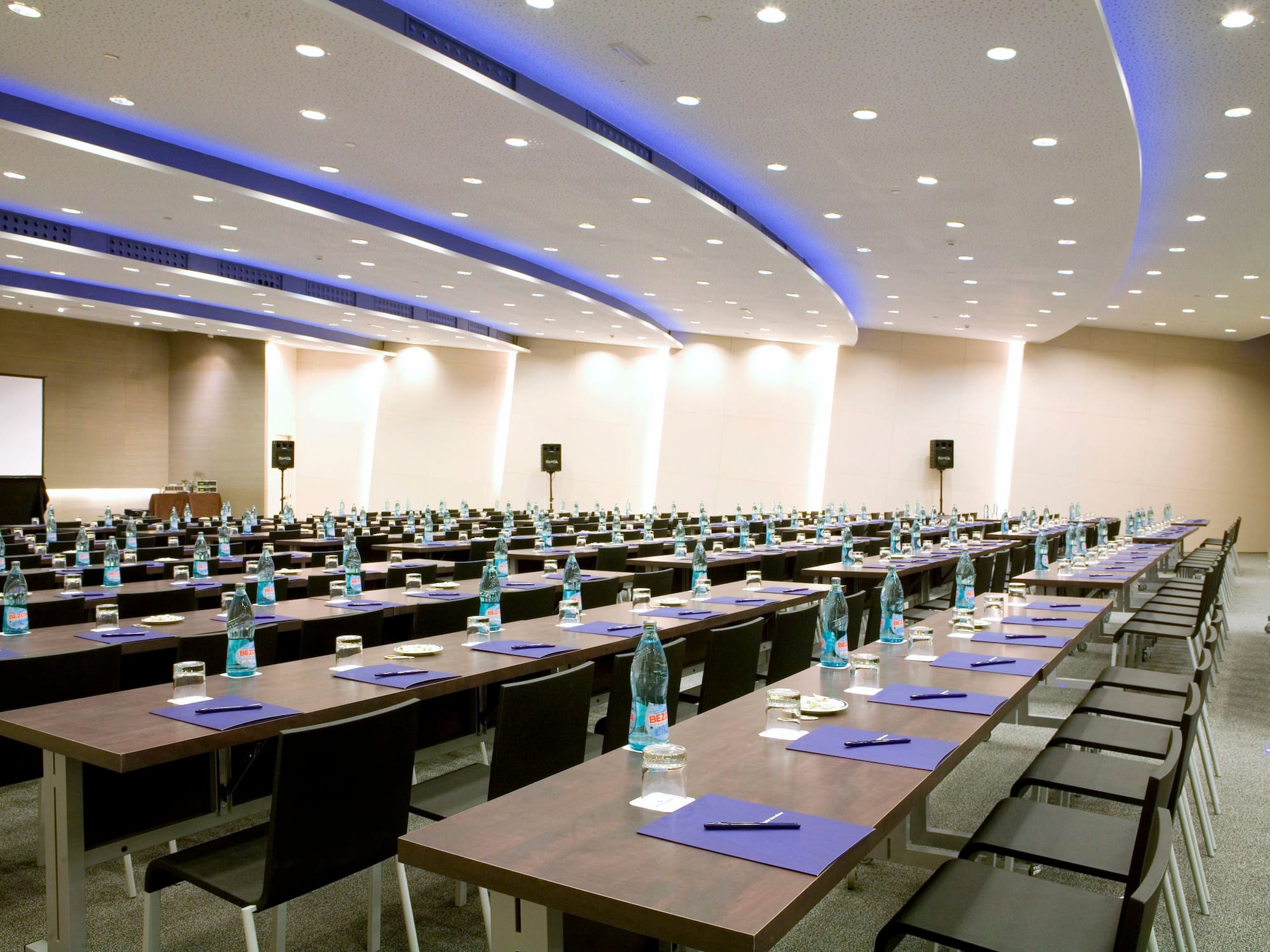 a room with tables and chairs