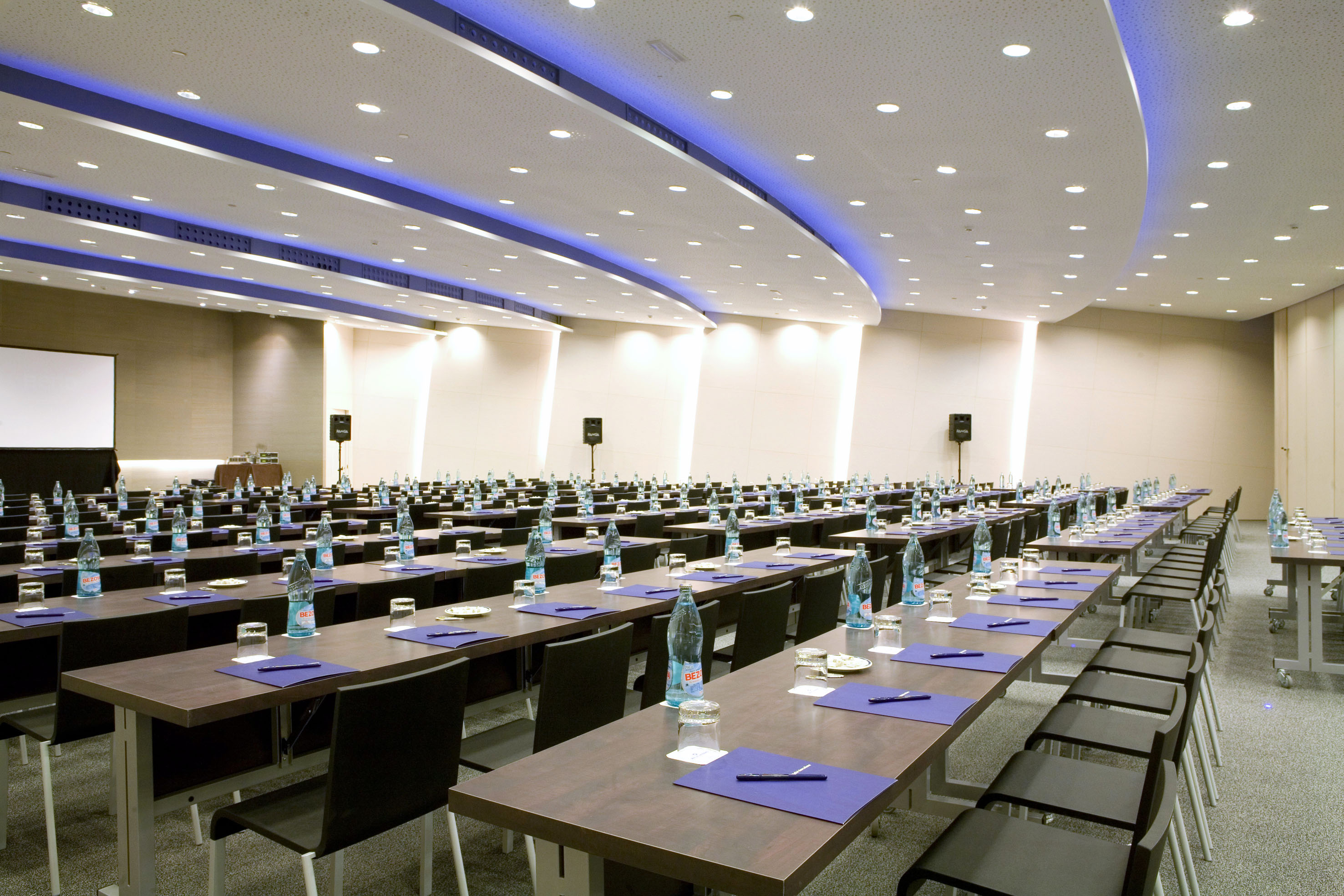 a room with tables and chairs