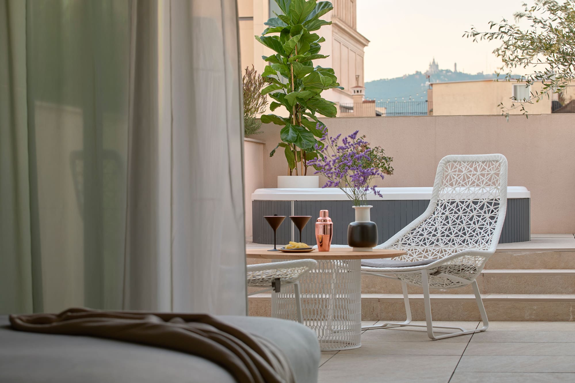a patio with a table and chairs
