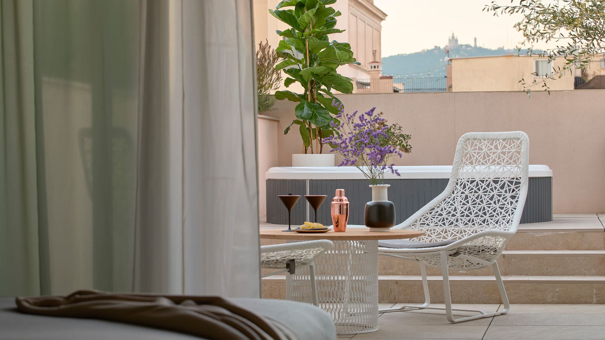 a patio with a table and chairs