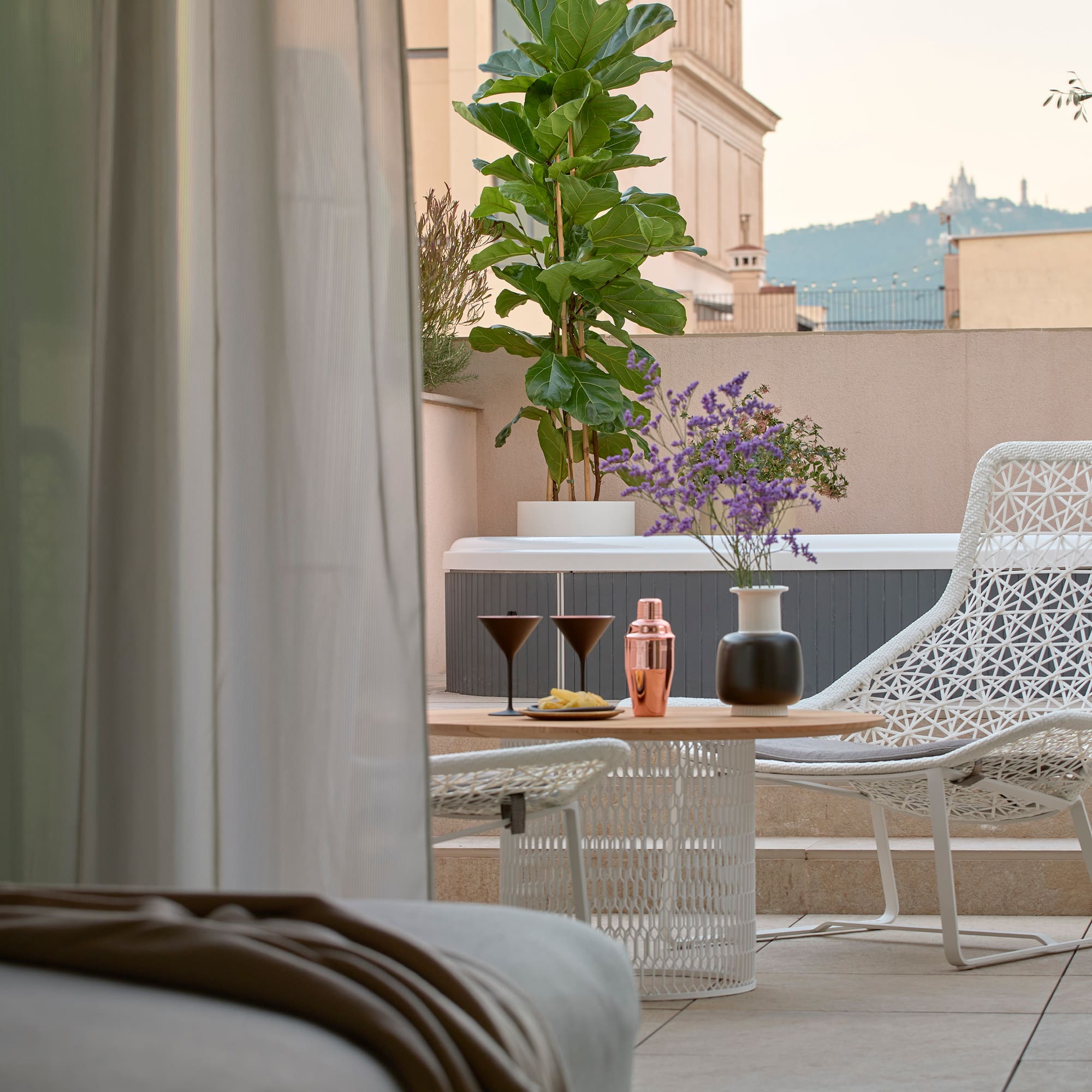 a patio with a table and chairs
