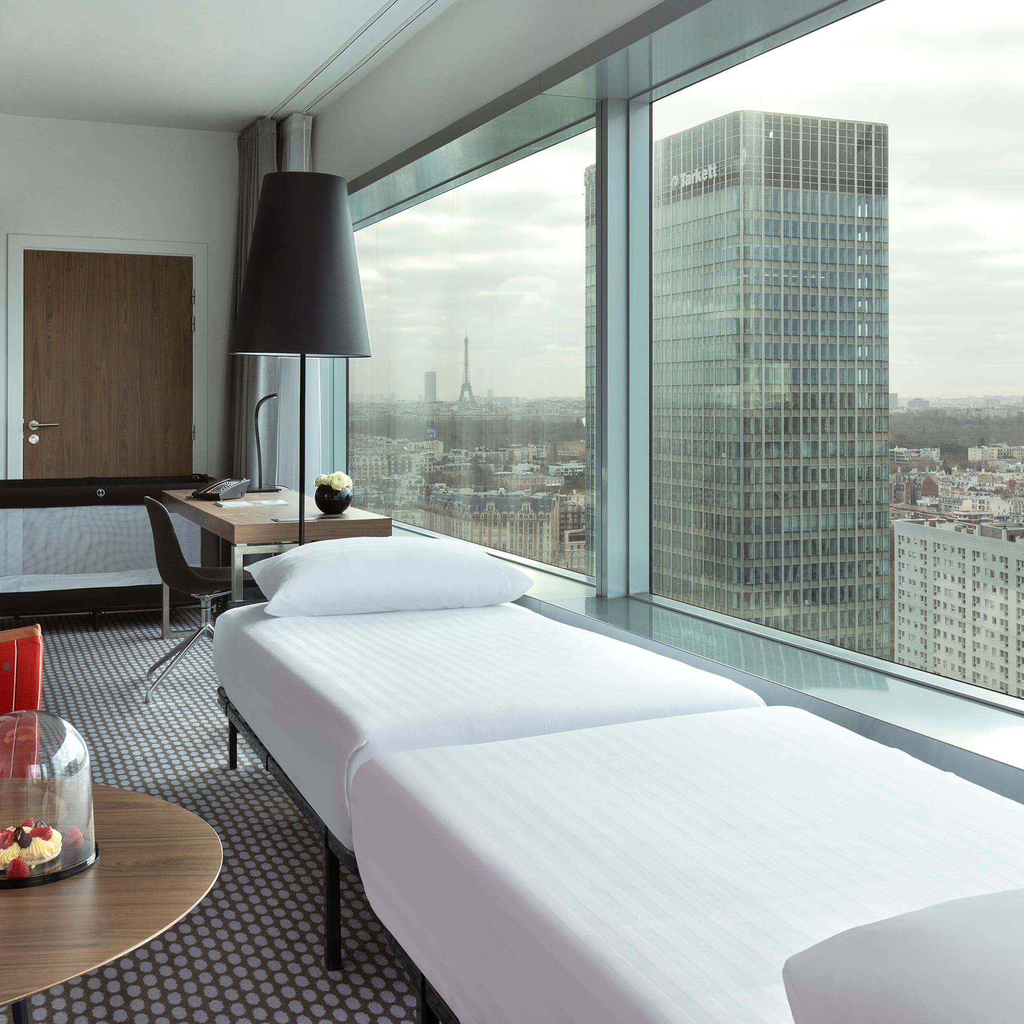 a room with a window overlooking a city