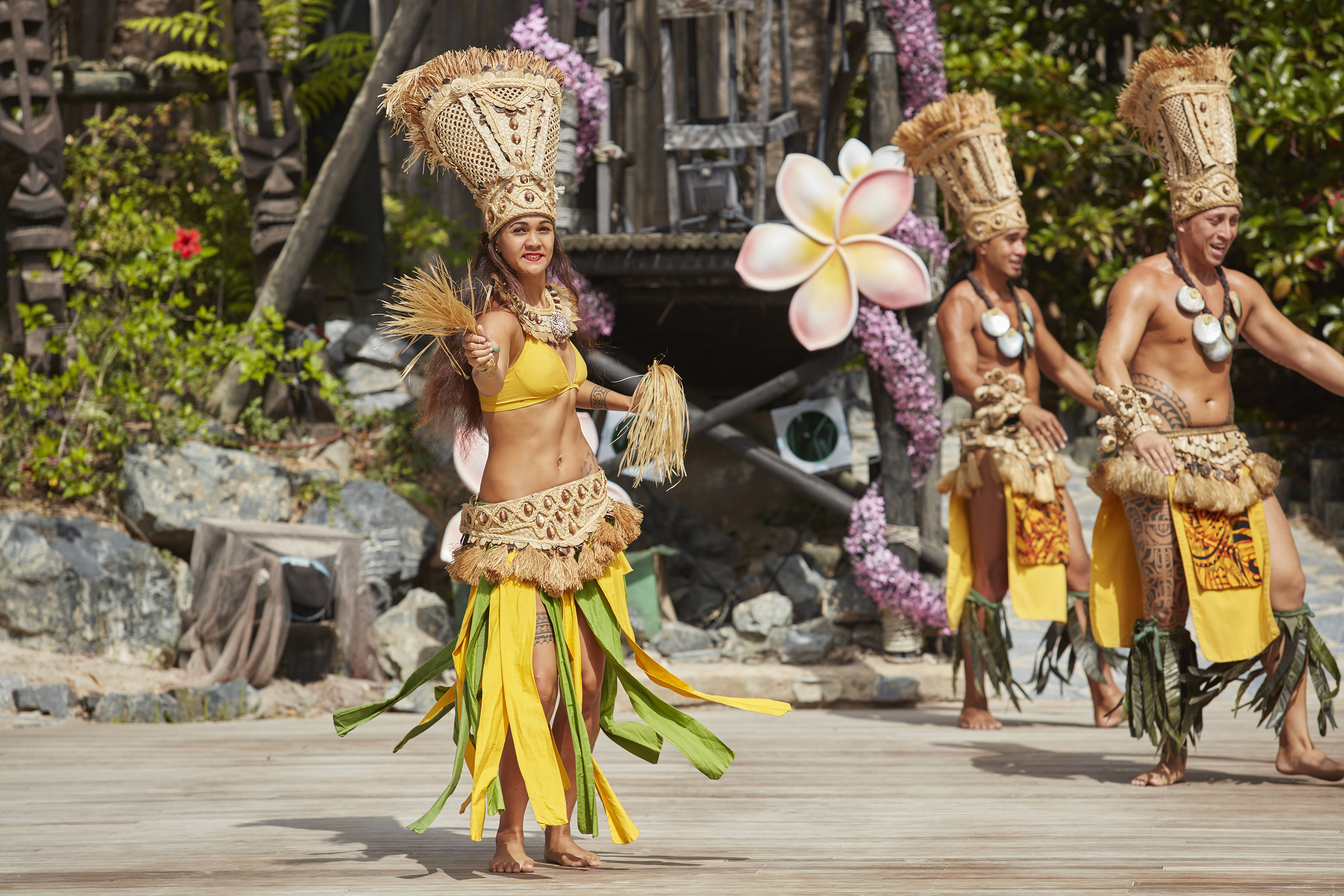 a group of people in clothing dancing