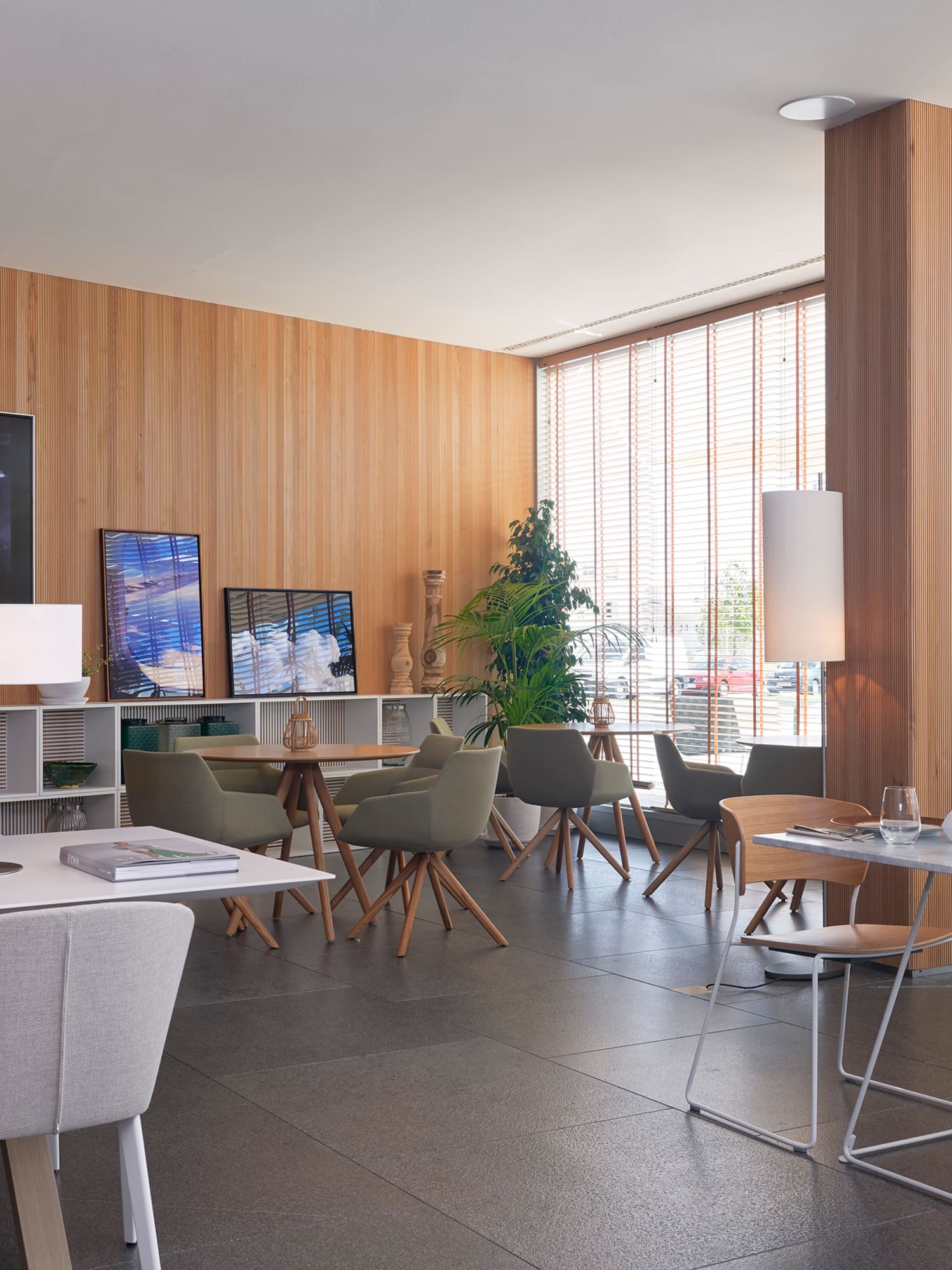 a room with a television and tables