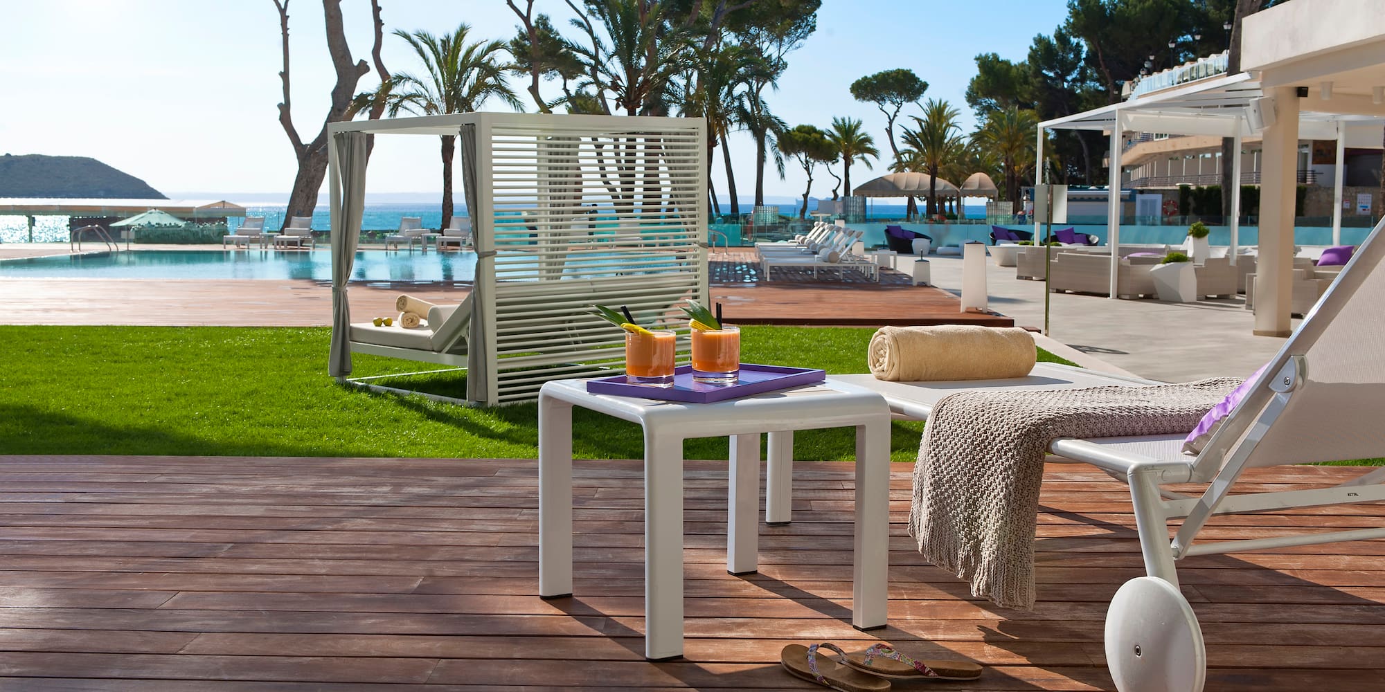 a table and chairs on a deck