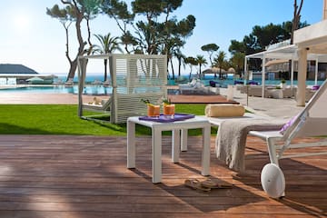 a table and chairs on a deck