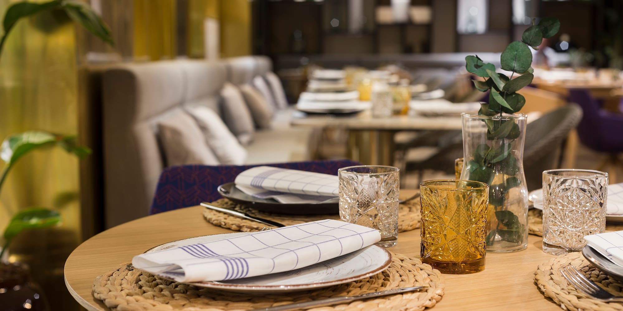 a table with plates and glasses on it