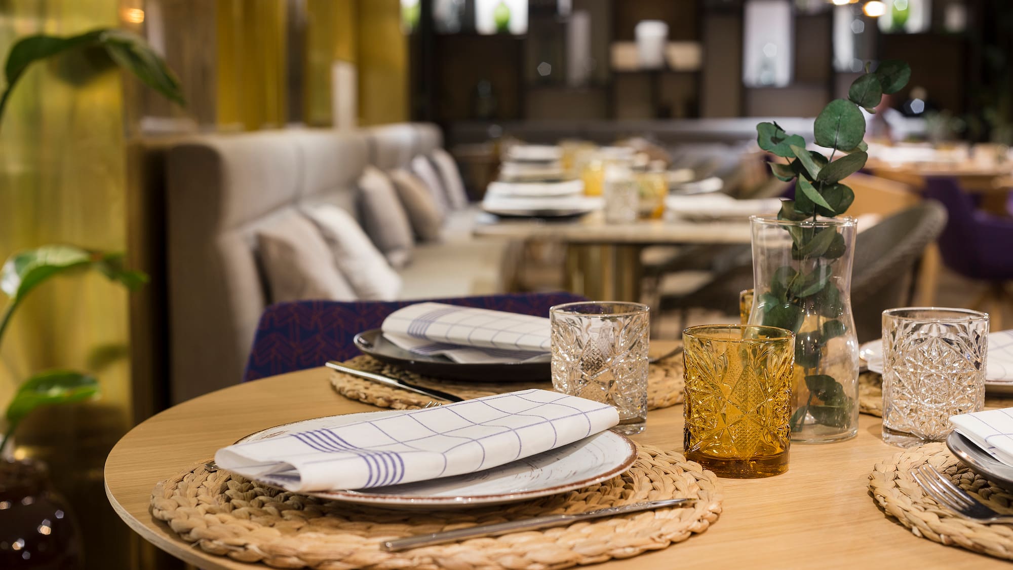 a table with plates and glasses on it