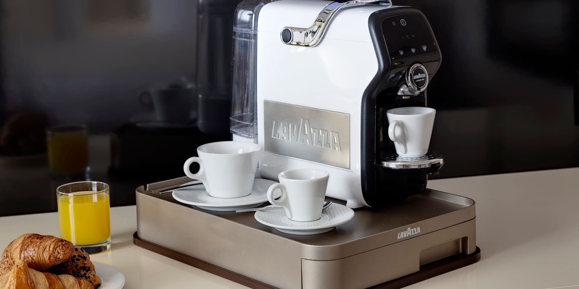 a coffee machine on a tray