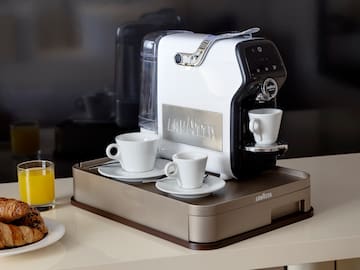 a coffee machine on a tray
