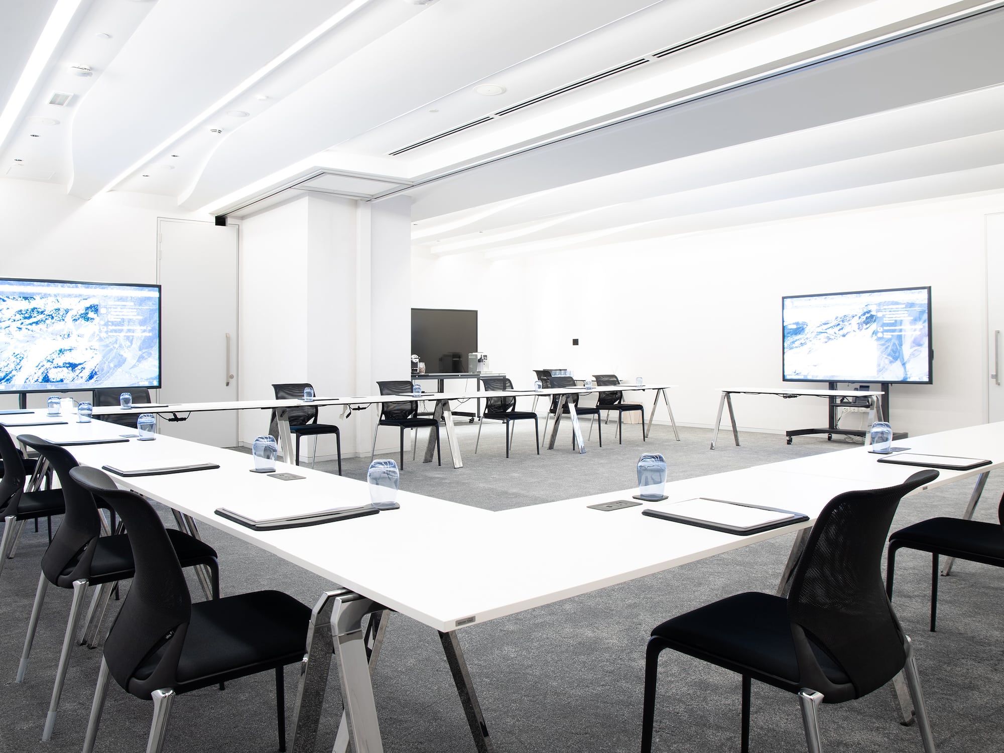 a room with tables and chairs