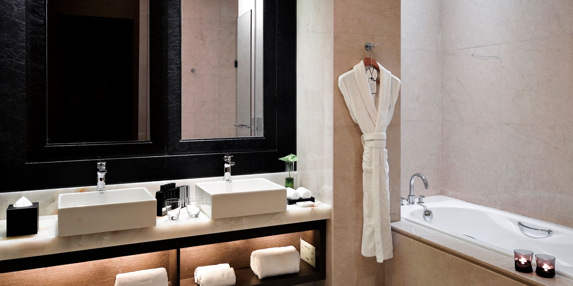 a bathroom with a bathtub and a bathtub