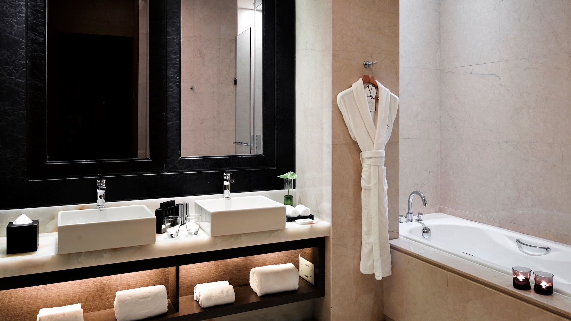 a bathroom with a bathtub and a bathtub