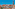 a bird flying over a city
