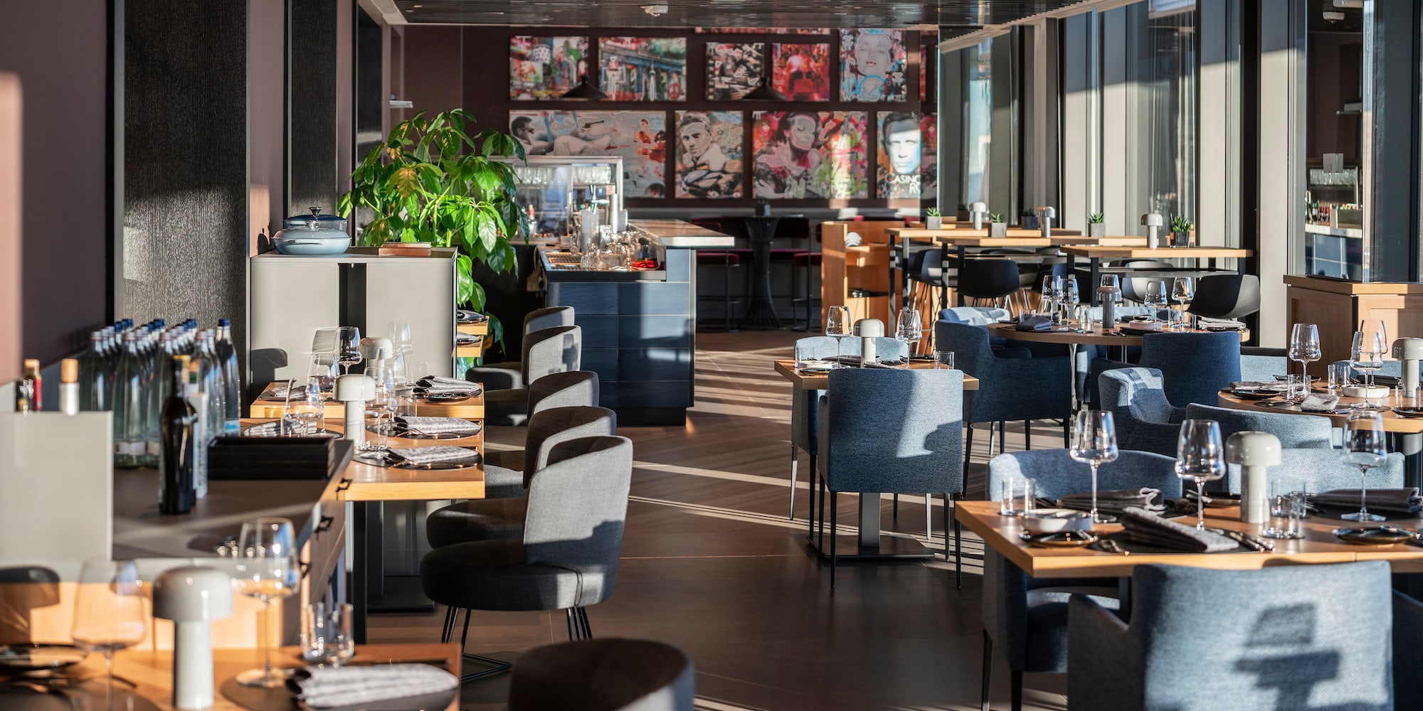 a restaurant with tables and chairs