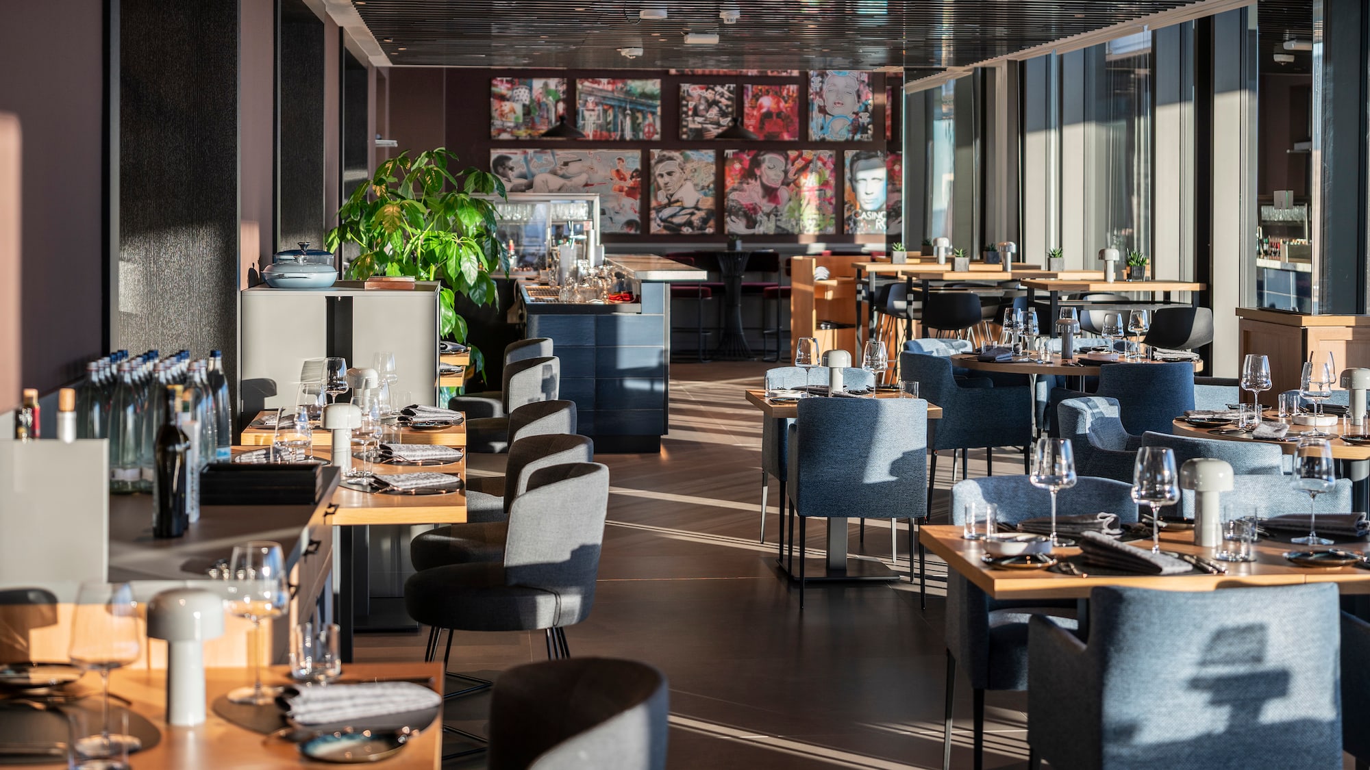 a restaurant with tables and chairs