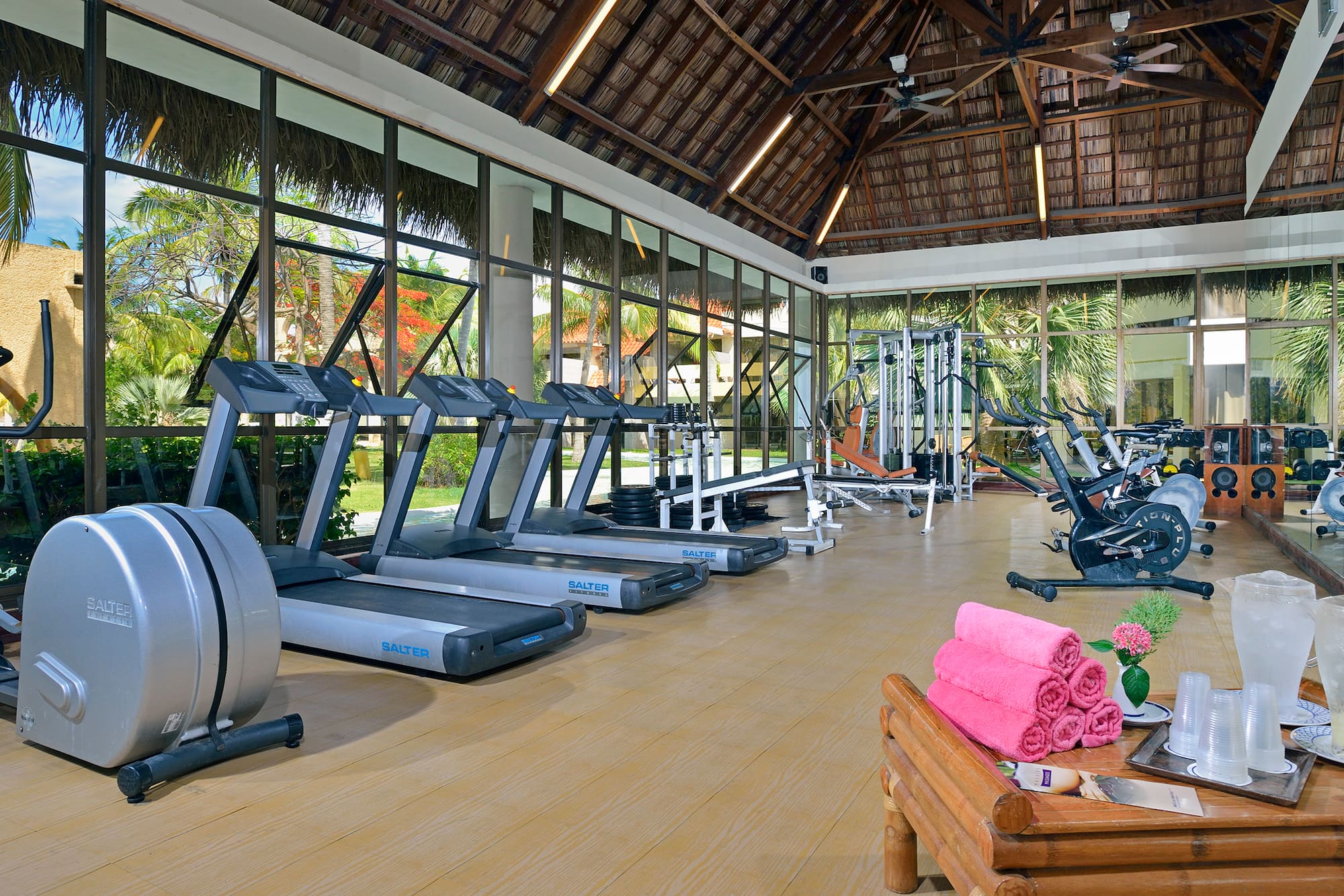 a large room with treadmills and exercise equipment