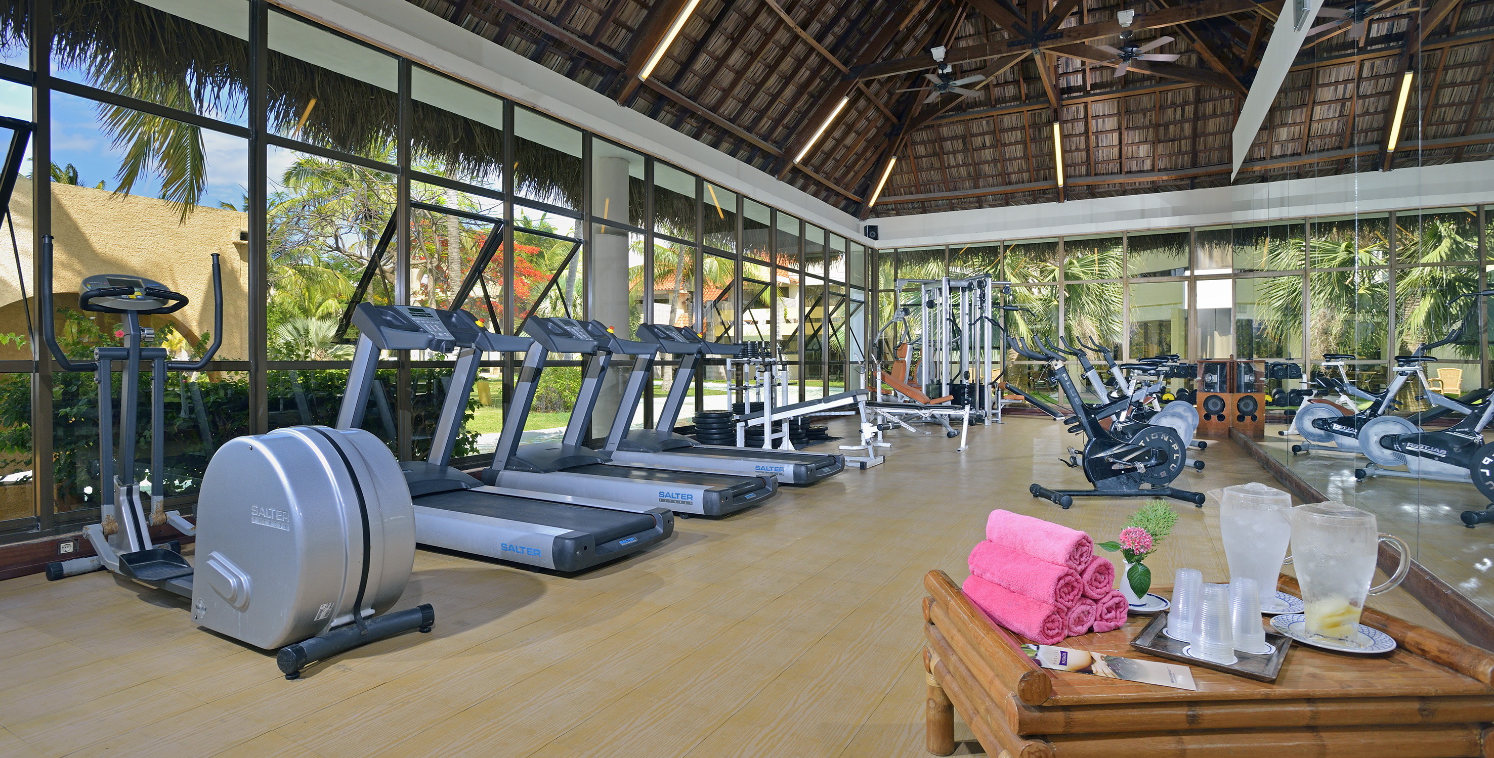 a large room with treadmills and exercise equipment