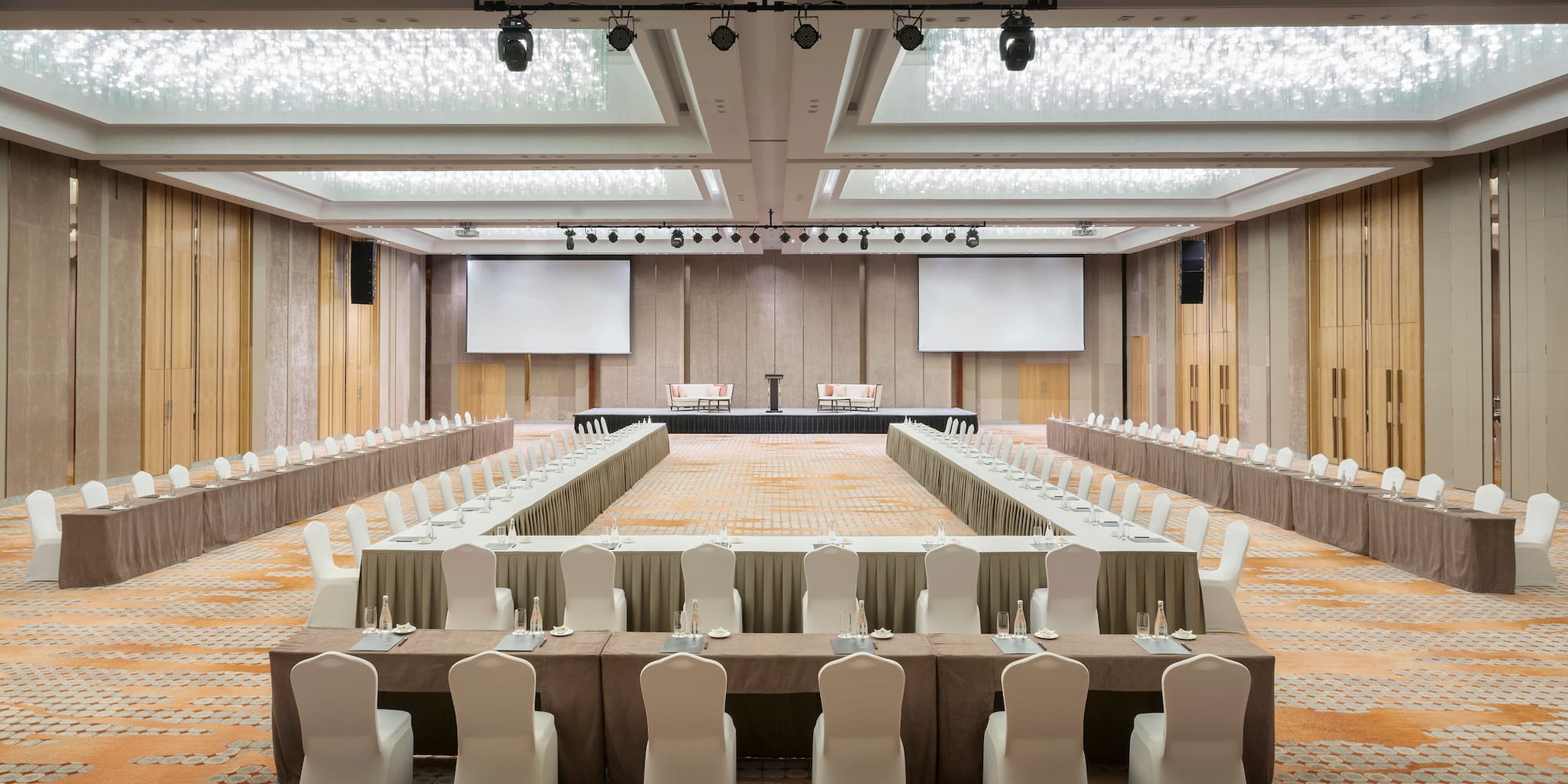 a large room with a large table and chairs