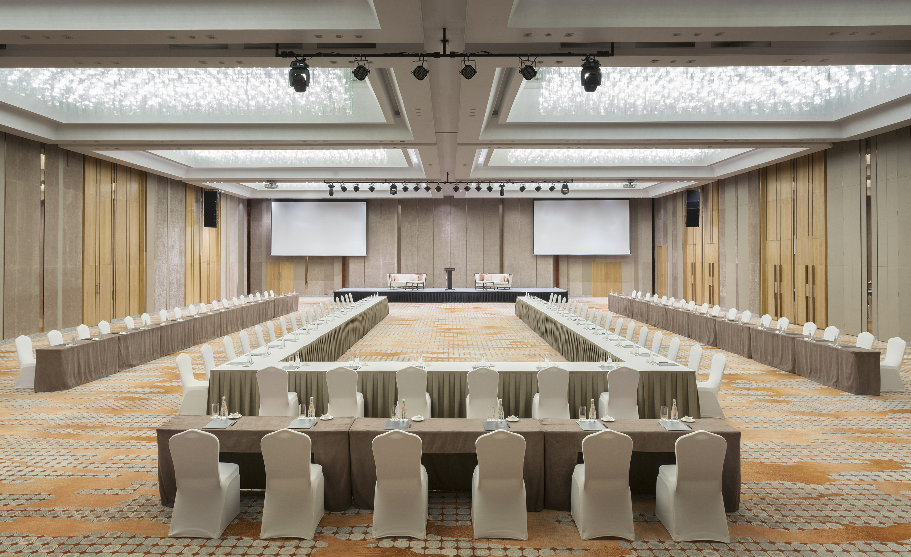a large room with a large table and chairs