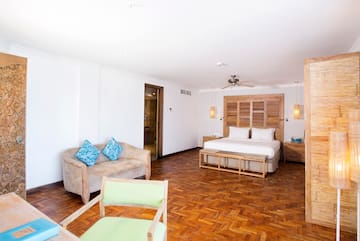 a room with a bed and a couch