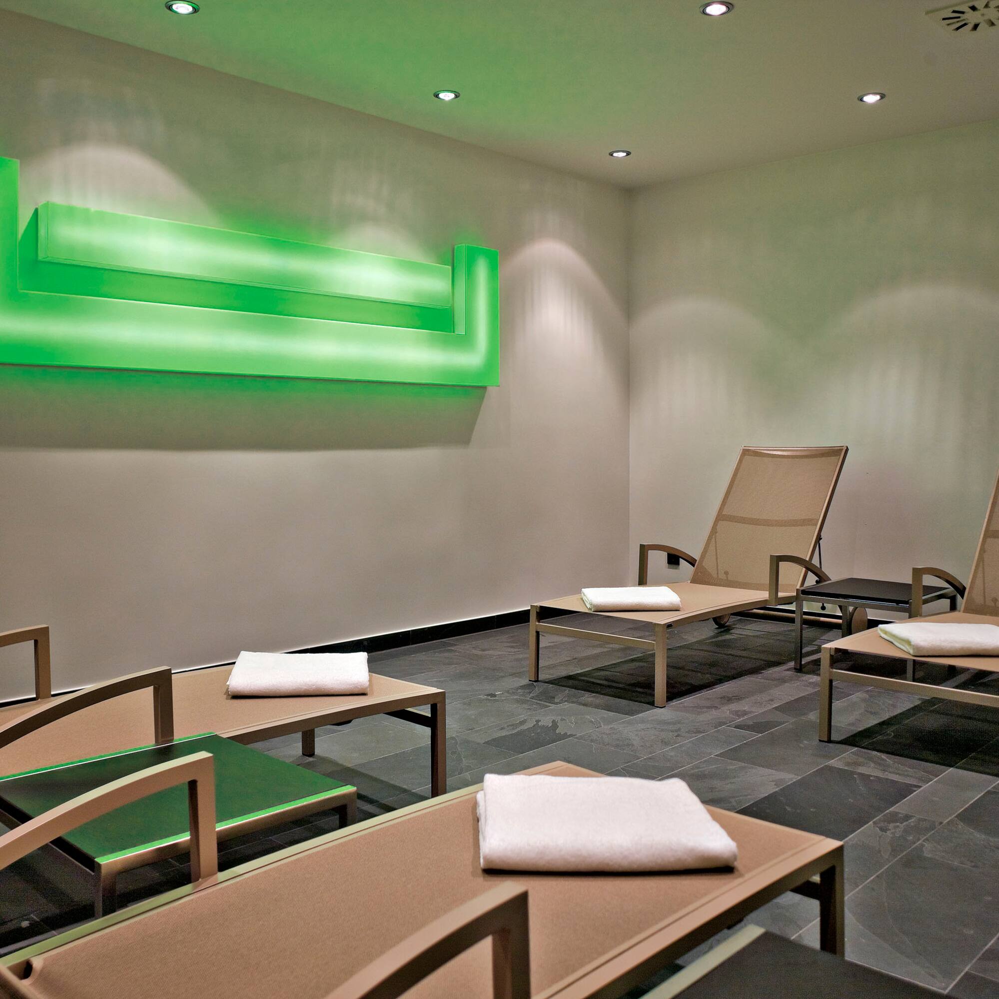 a room with chairs and tables