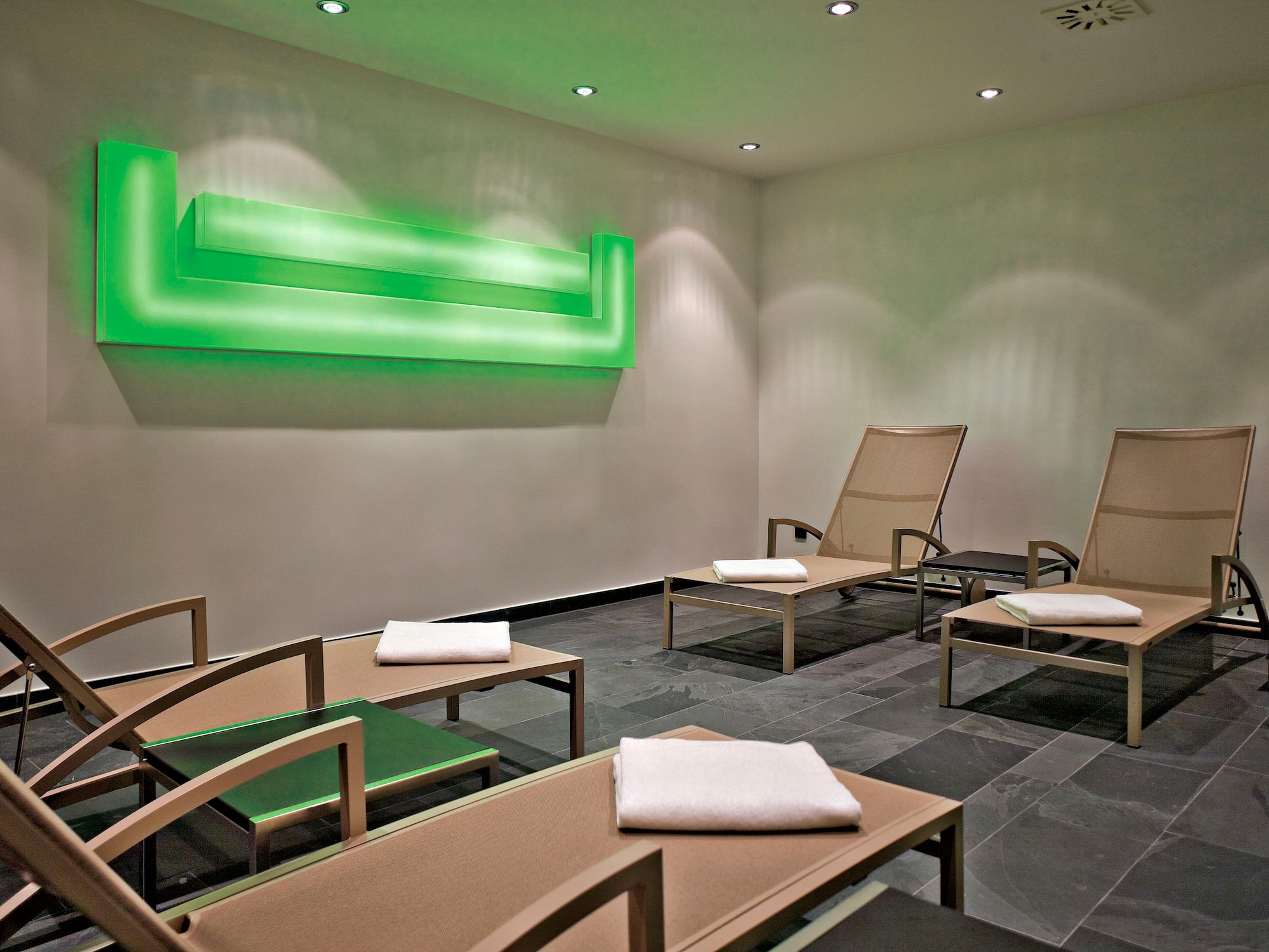 a room with chairs and tables