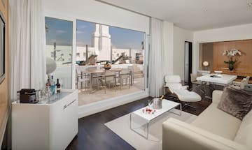 a living room with a large sliding glass door