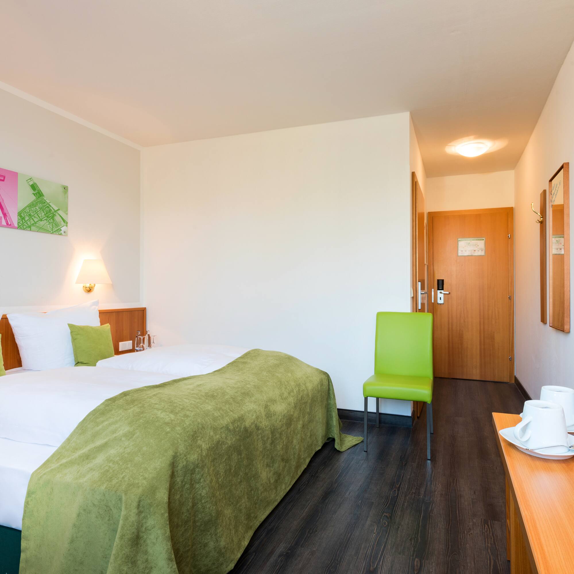 a room with a bed and a chair