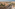 Rome aerial cityscape with Tiber River, Castel Sant'Angelo, and historic bridges.