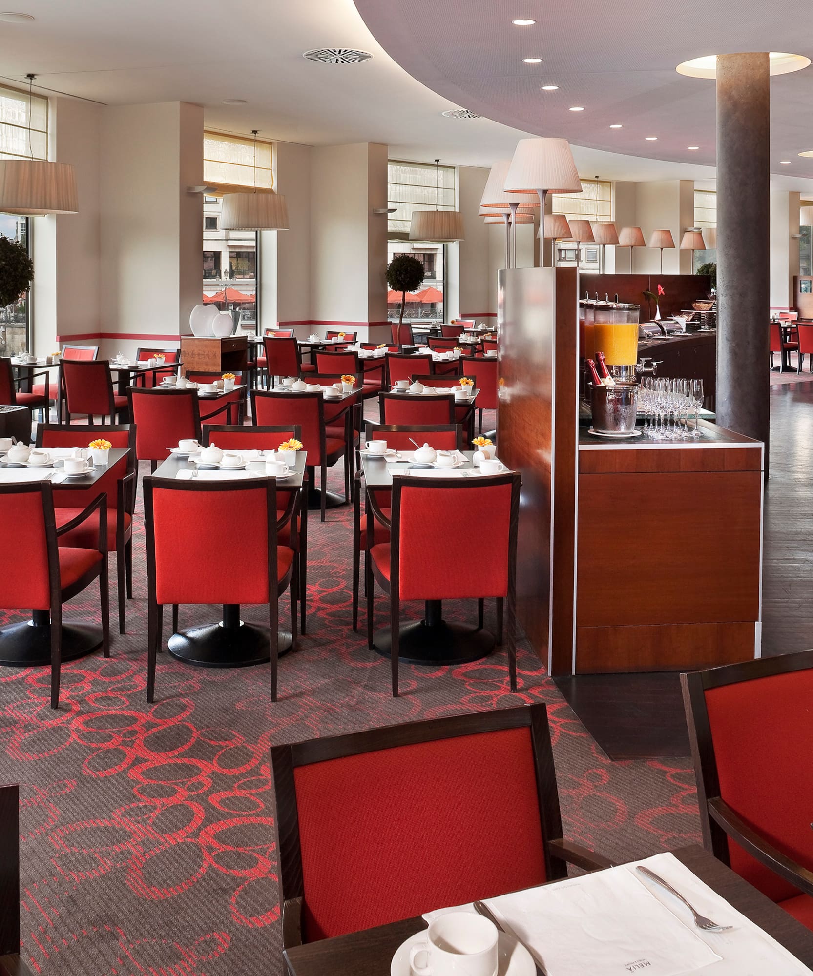 a restaurant with tables and chairs