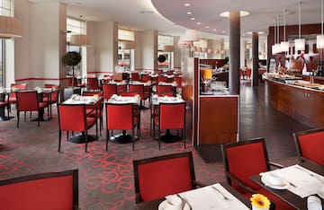 a restaurant with tables and chairs