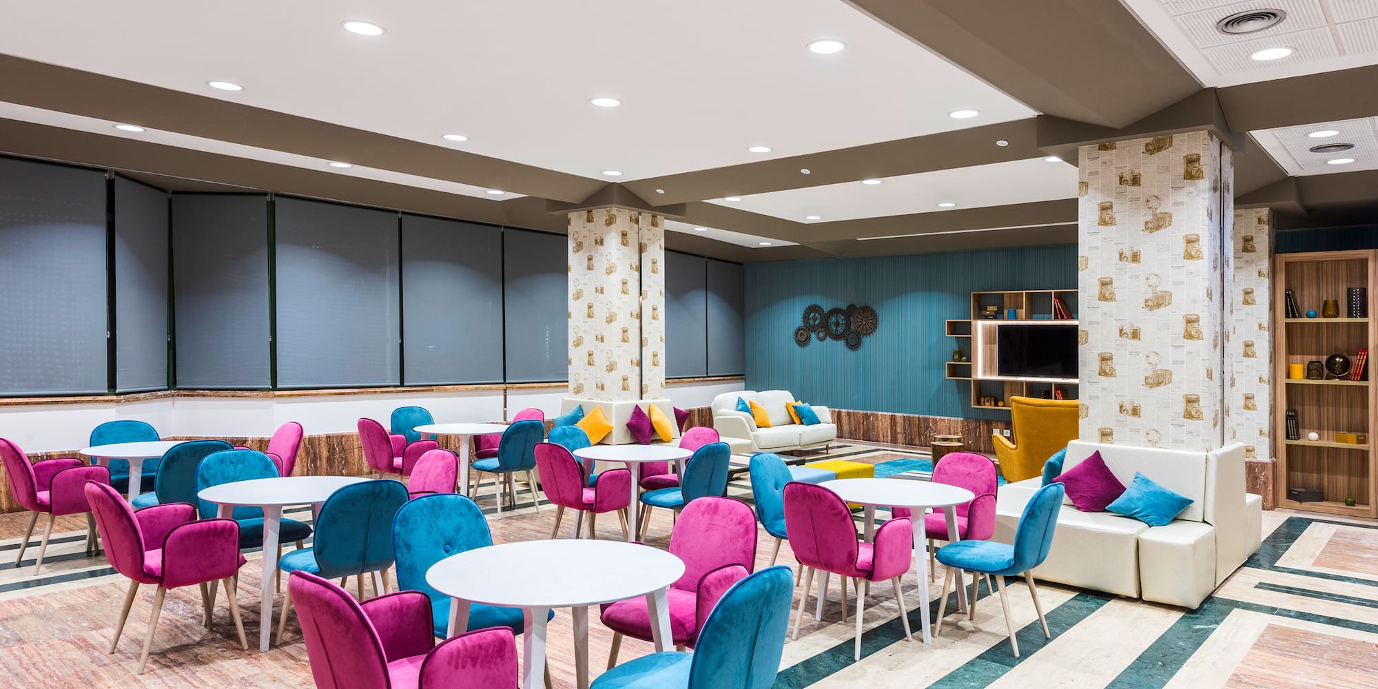 a room with tables and chairs