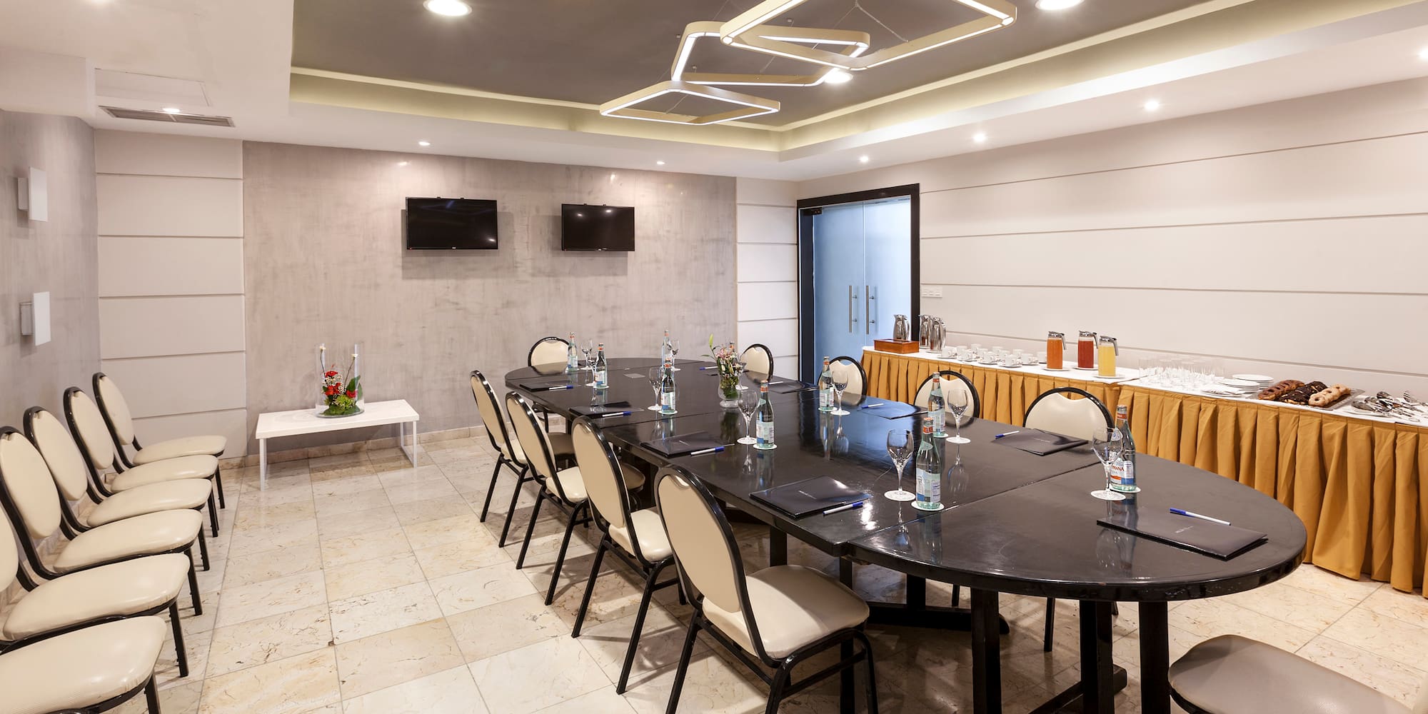 a room with a table and chairs