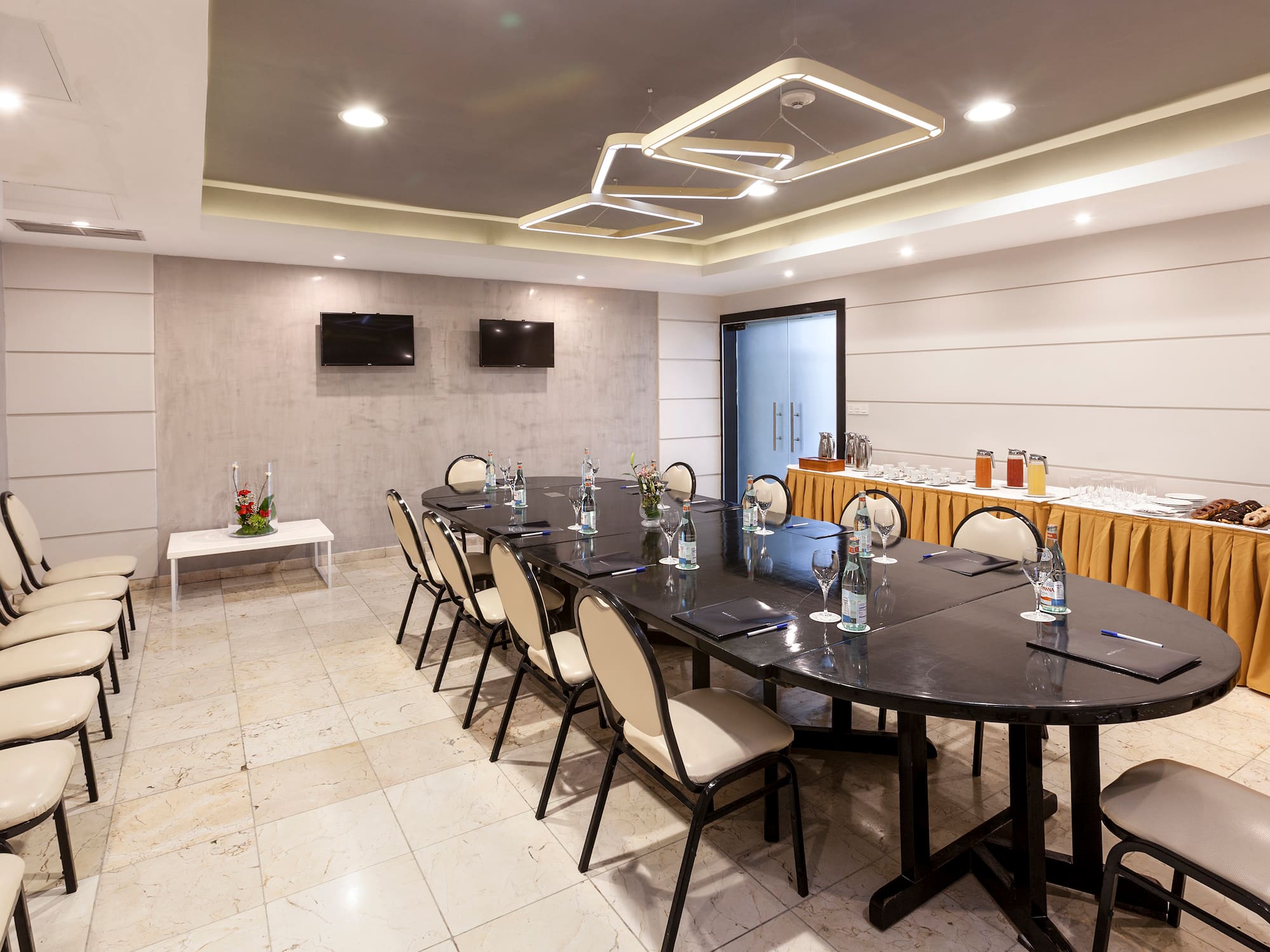 a room with a table and chairs