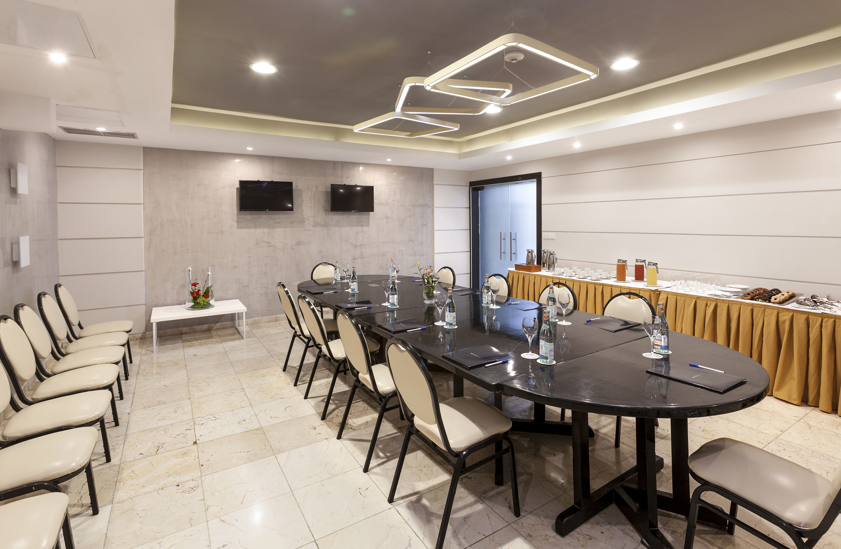 a room with a table and chairs