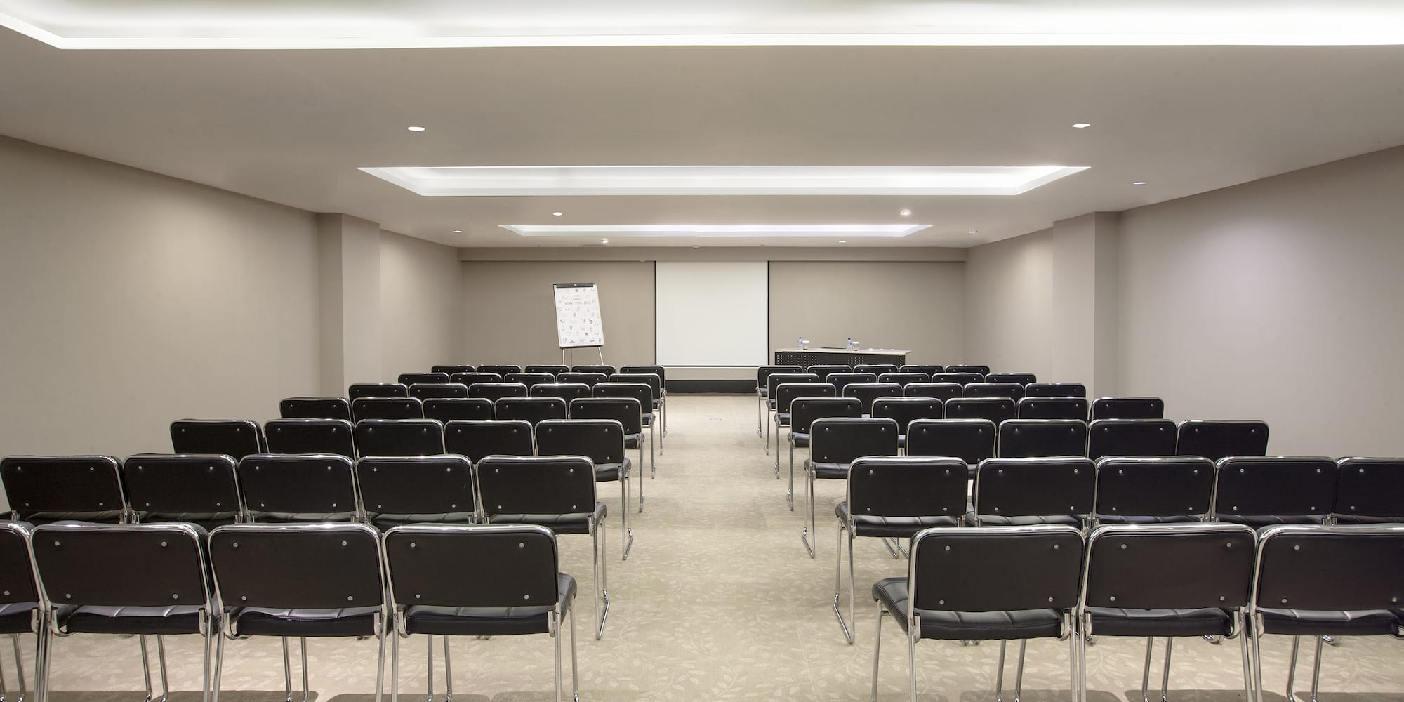 a room with rows of chairs