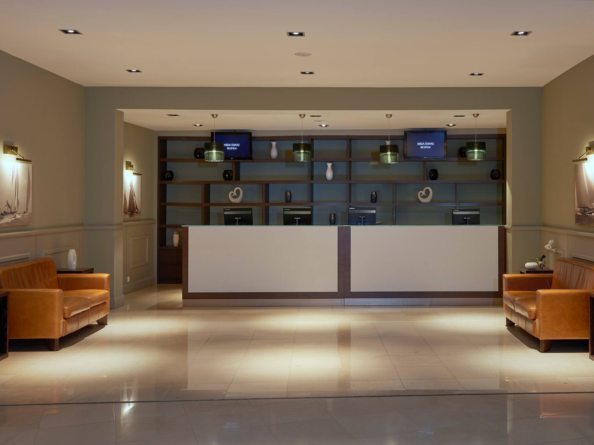 a reception desk in a hotel