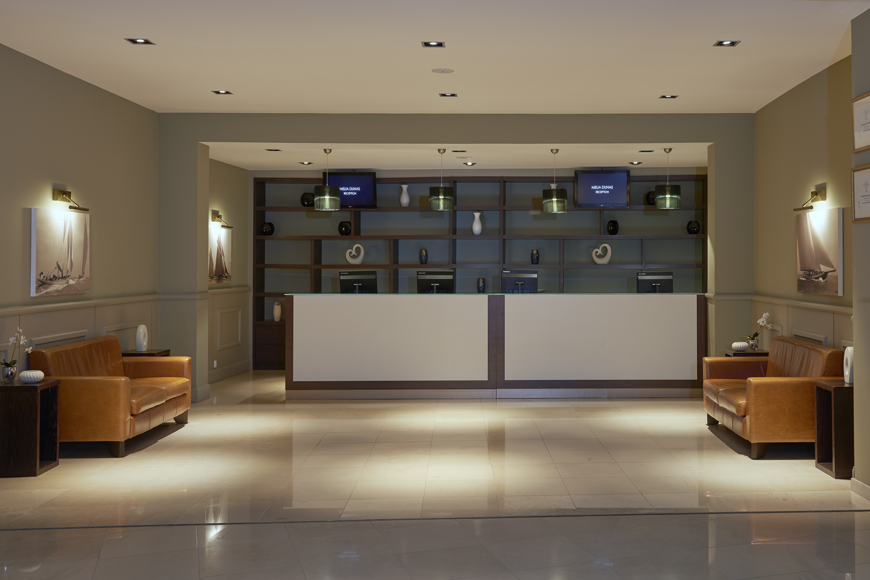 a reception desk in a hotel