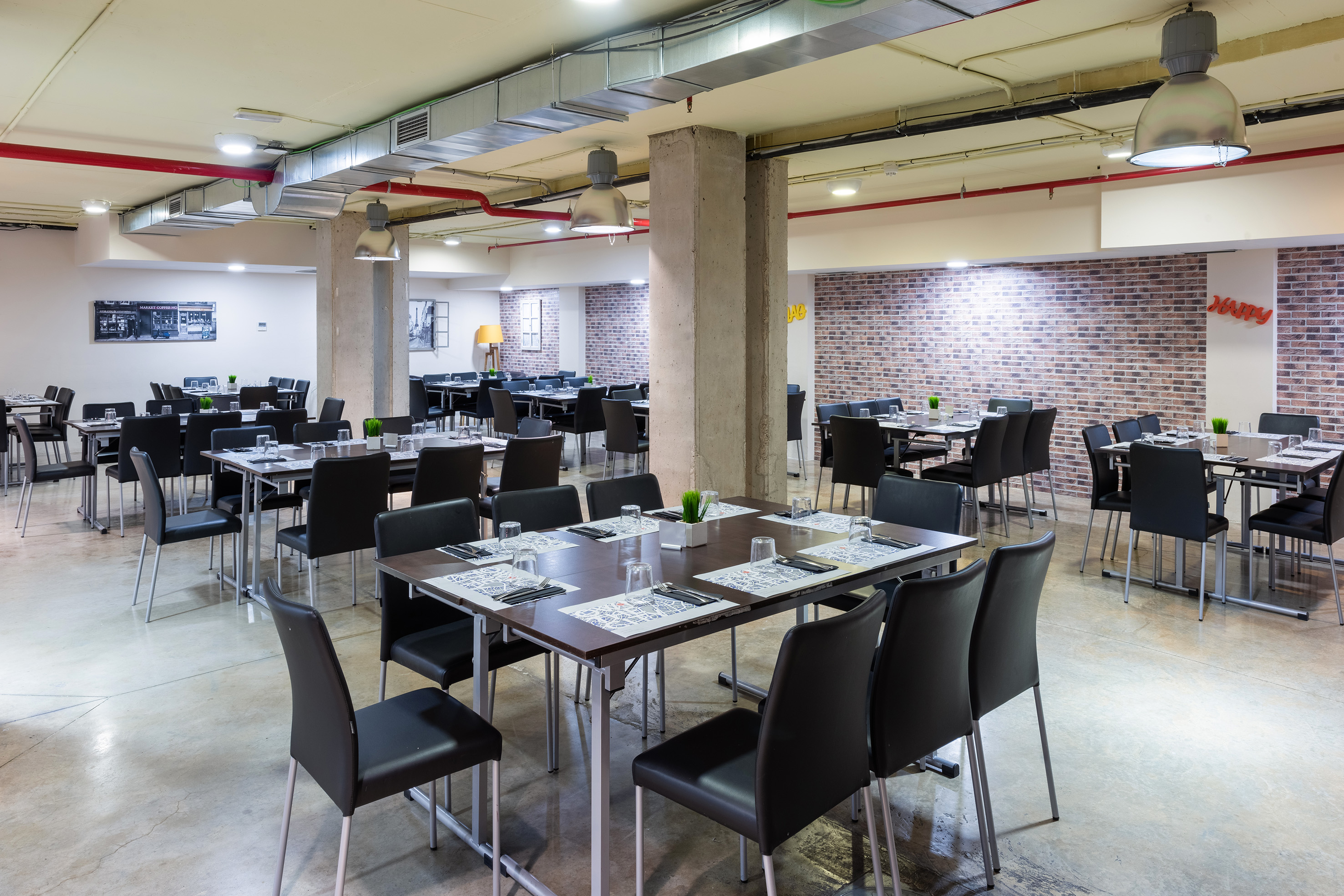 a room with tables and chairs