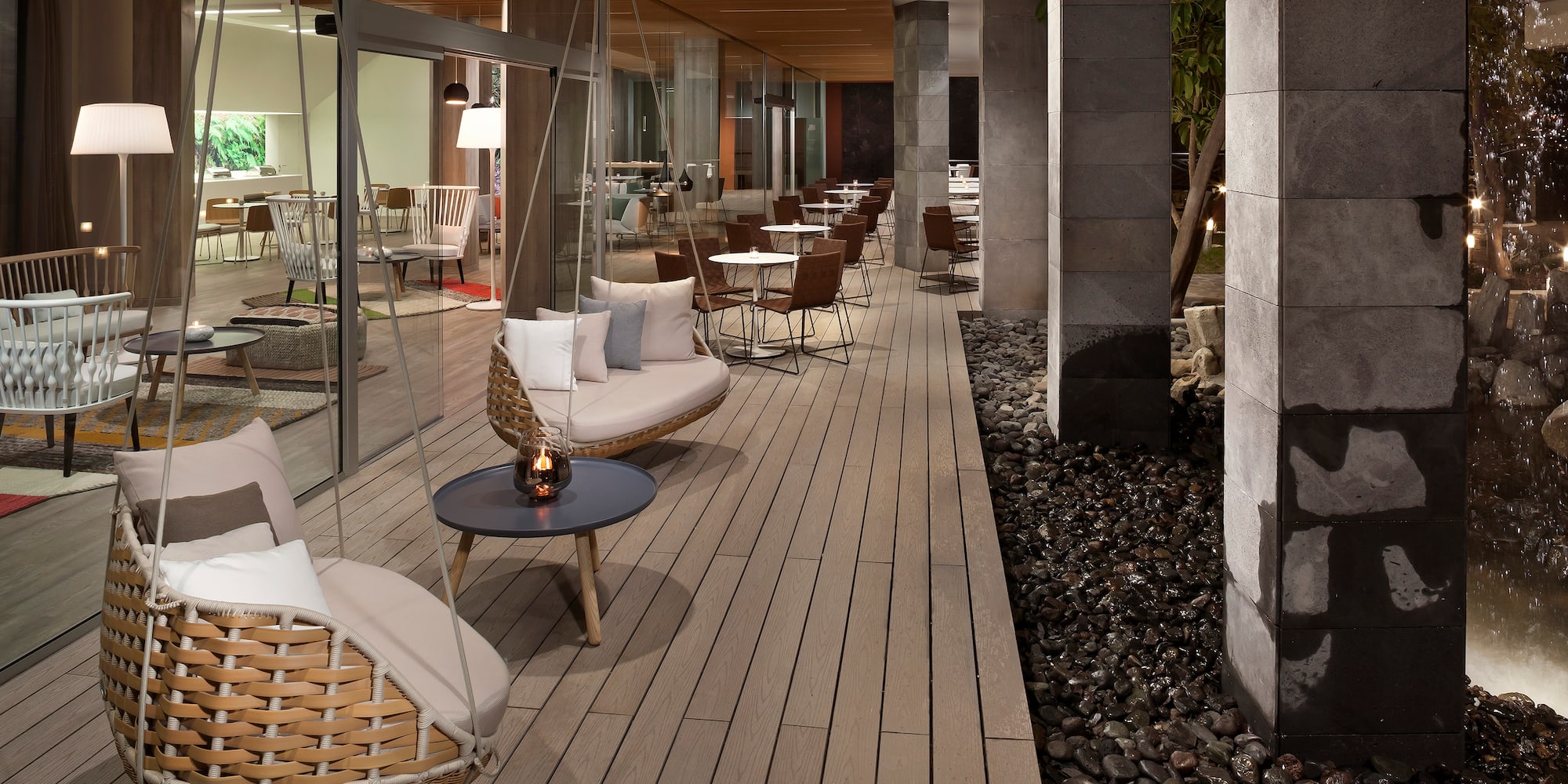 a patio with chairs and tables