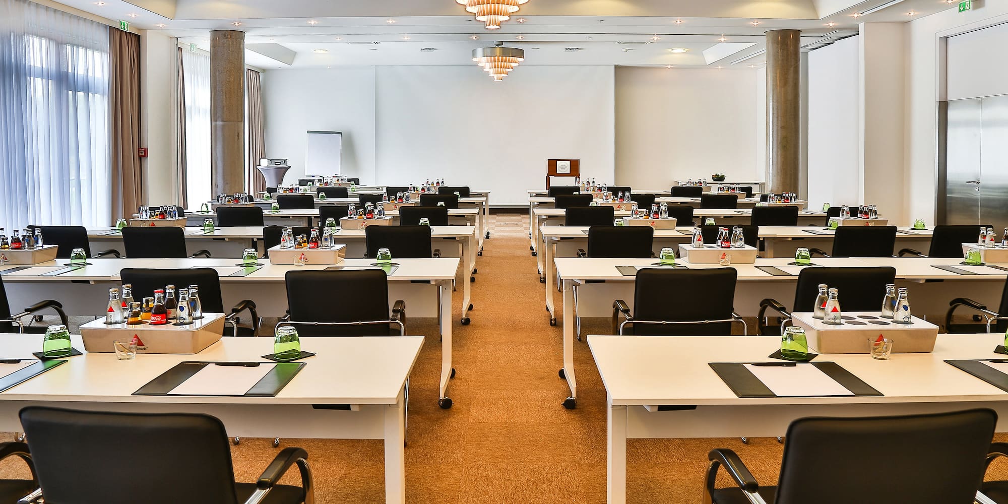a room with tables and chairs