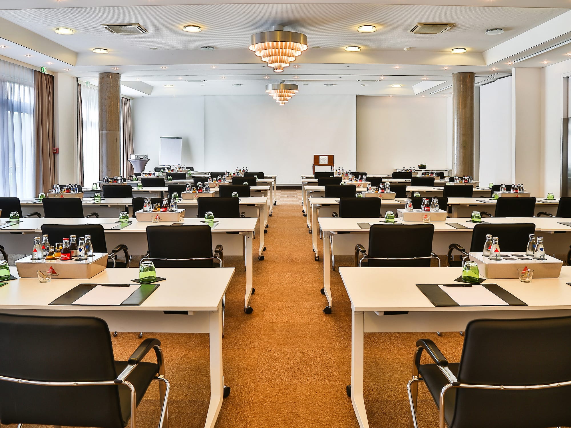 a room with tables and chairs