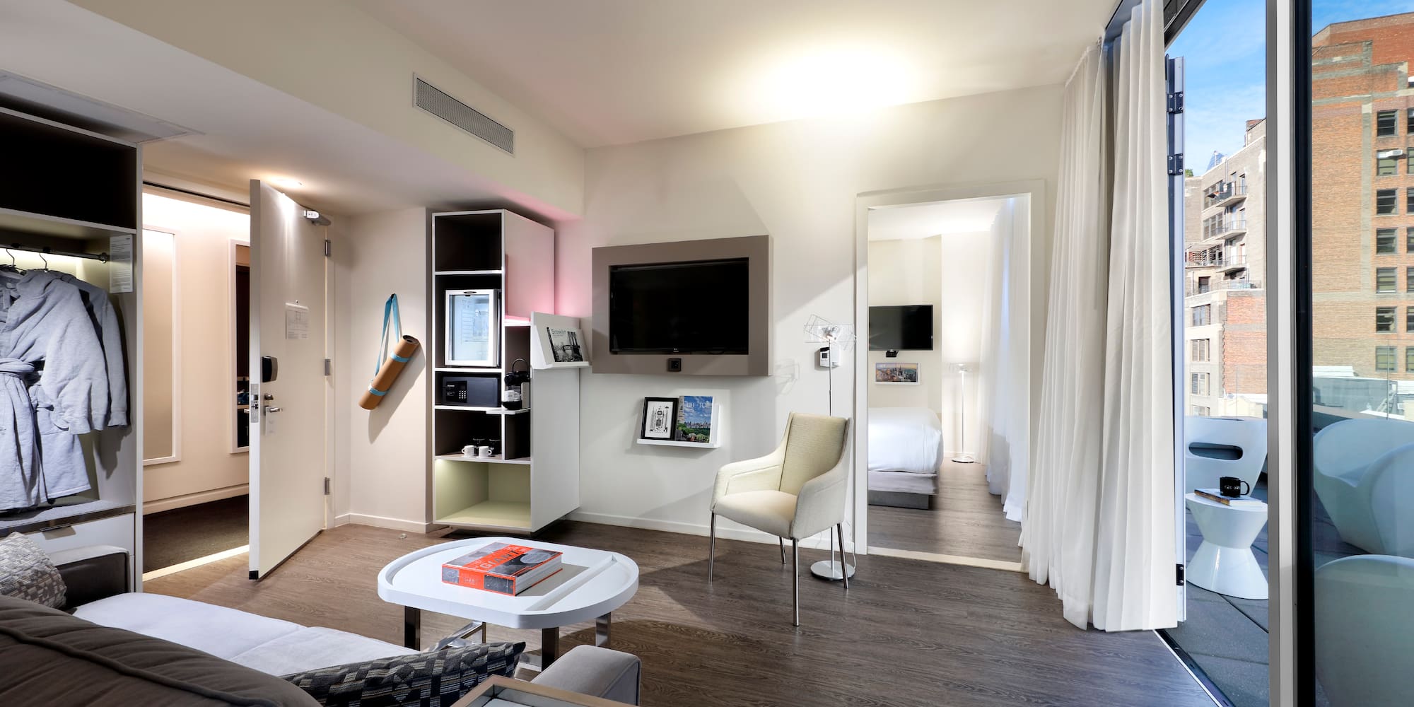 a room with a tv and a couch