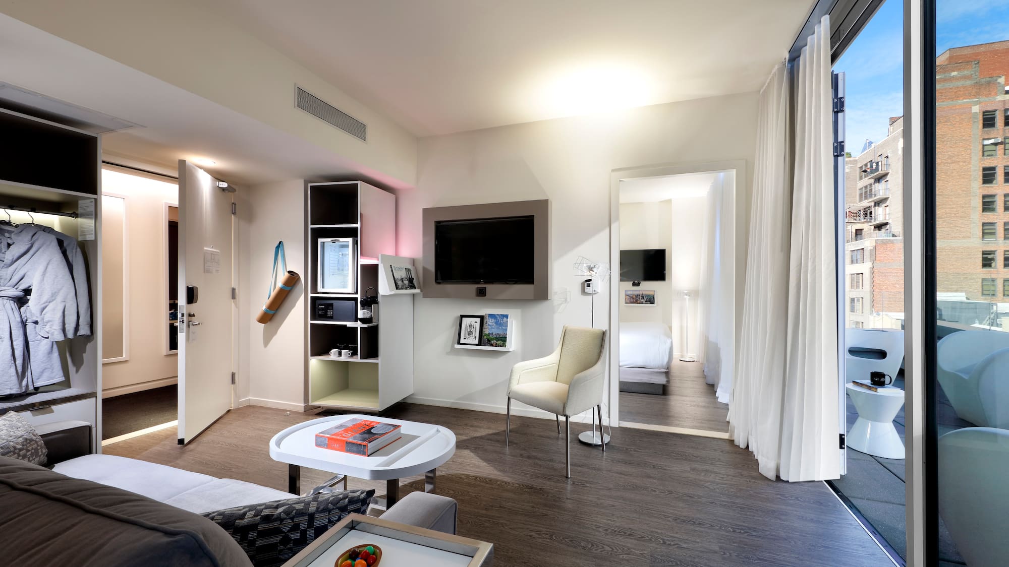 a room with a tv and a couch